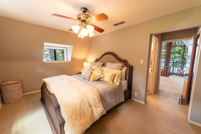329 Hickory Hill Ln, Scroggins, TX 75480 - bedroom featuring multiple windows, light carpet, and a ceiling fan