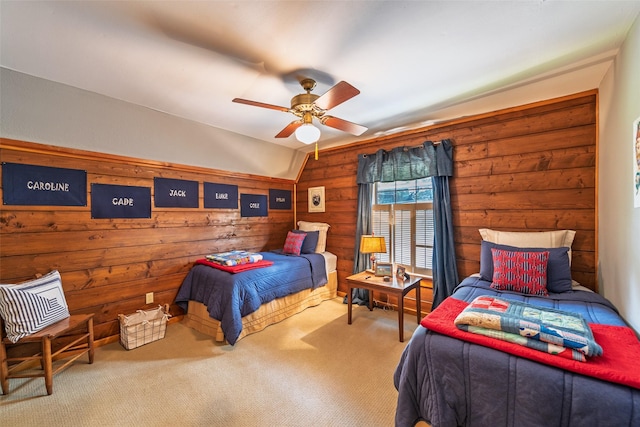 329 Hickory Hill Ln, Scroggins, TX 75480 - carpeted bedroom with wooden walls and a ceiling fan