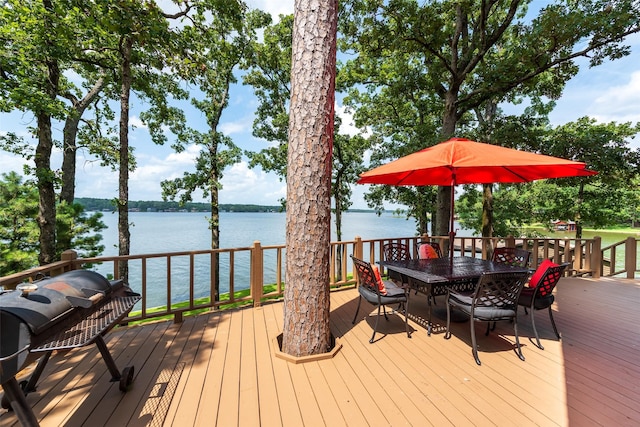 329 Hickory Hill Ln, Scroggins, TX 75480 - wooden terrace with a water view and outdoor dining space