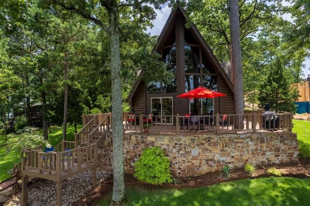 329 Hickory Hill Ln, Scroggins, TX 75480 - rear view of property with a wooden deck