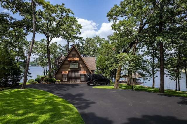 329 Hickory Hill Ln, Scroggins, TX 75480 - a-frame style home with a water view, a front lawn, and driveway