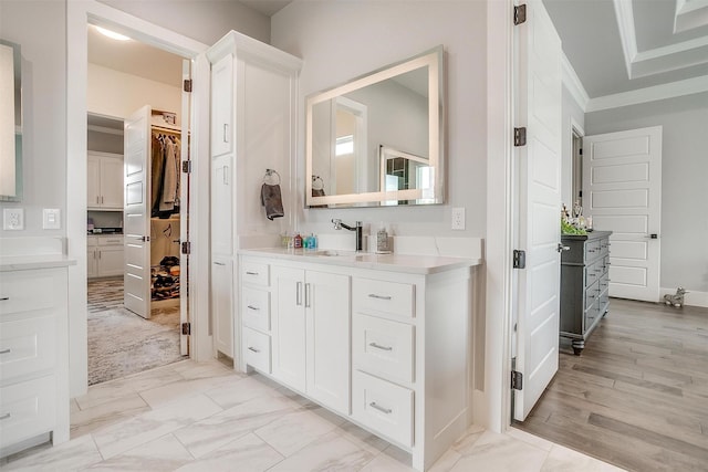 720 Glade Park Ct, Azle, TX 76020 - full bath featuring vanity, ornamental molding, and a walk in closet