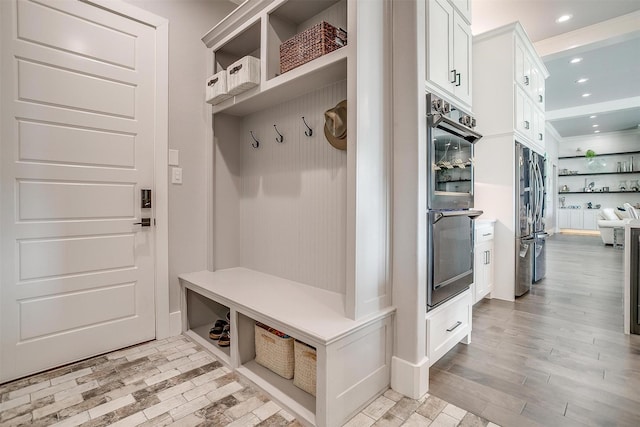 720 Glade Park Ct, Azle, TX 76020 - mudroom with light wood-type flooring and recessed lighting