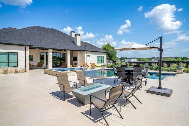 720 Glade Park Ct, Azle, TX 76020 - swimming pool featuring an outdoor fire pit, a patio, outdoor dining area, and an in-ground hot tub