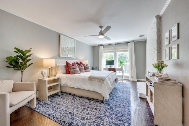 9126 Valley Chapel Ln, Dallas, TX 75220 - bedroom with crown molding, wood finished floors, ceiling fan, and access to exterior