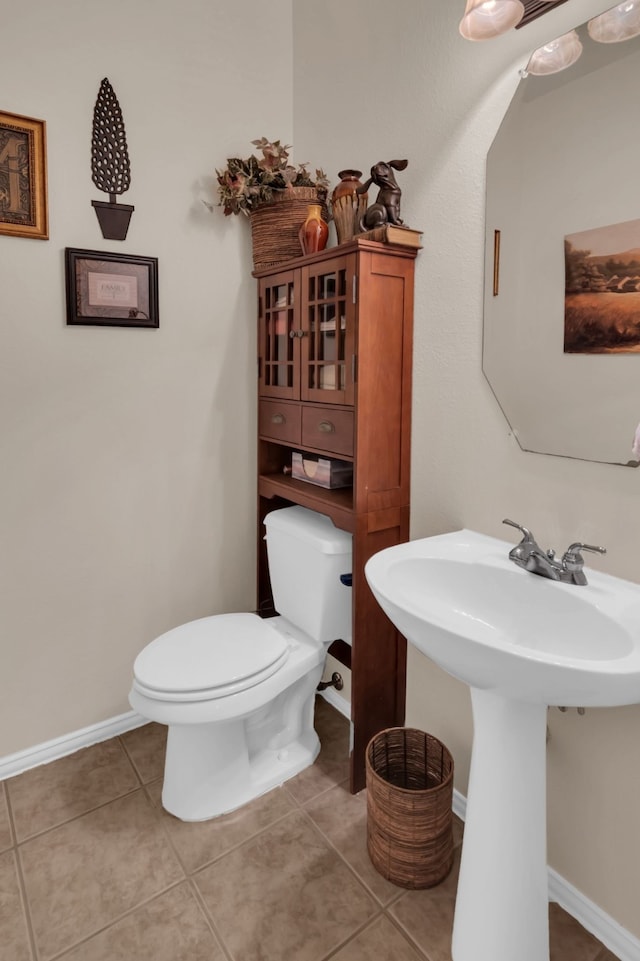 5233 Scenic Point Dr, Fort Worth, TX 76244 - half bathroom featuring toilet and tile patterned flooring