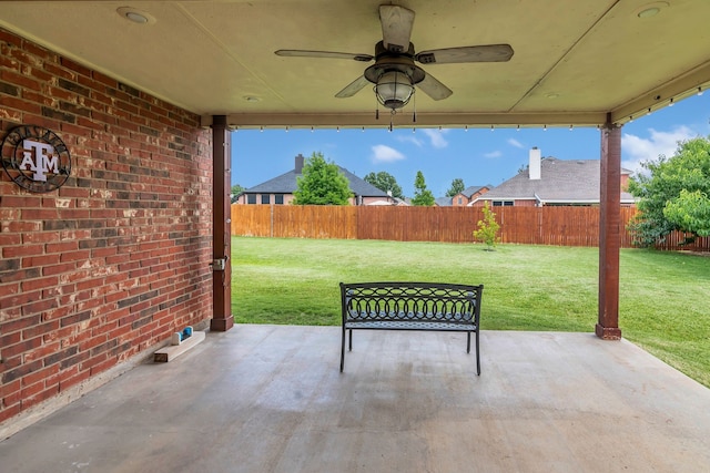 5233 Scenic Point Dr, Fort Worth, TX 76244 - fenced backyard featuring a patio and a ceiling fan
