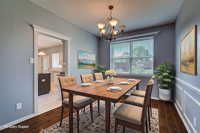 1015 Midnight Pass, Rockwall, TX 75087 - dining area featuring wood-type flooring, plenty of natural light, and a chandelier