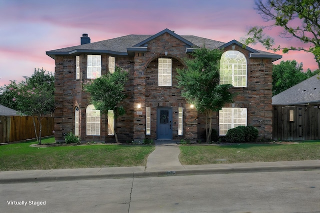 1015 Midnight Pass, Rockwall, TX 75087 - view of front of property featuring a chimney and brick siding