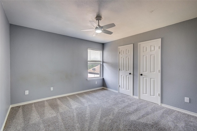 1015 Midnight Pass, Rockwall, TX 75087 - unfurnished bedroom with carpet flooring and ceiling fan