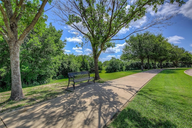 1015 Midnight Pass, Rockwall, TX 75087 - view of home's community with a yard and view of wooded area