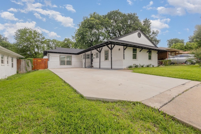 621 New Market Rd, Mesquite, TX 75149 - view of front facade with driveway and brick siding
