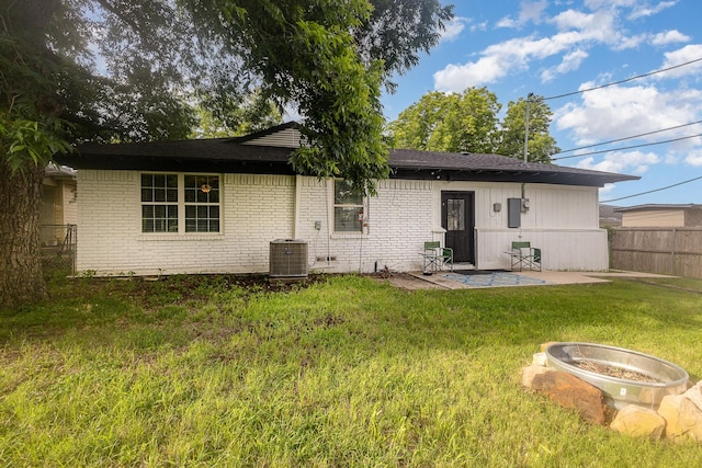 621 New Market Rd, Mesquite, TX 75149 - back of property featuring a patio and brick siding