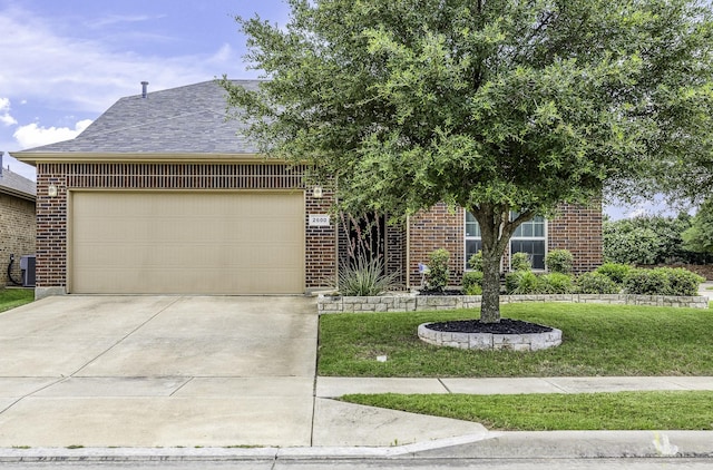 2600 Canyon Wren Ln, Fort Worth, TX 76244 - view of front of home with brick siding, concrete driveway, a front lawn, and a garage