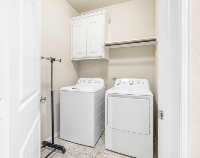 2600 Canyon Wren Ln, Fort Worth, TX 76244 - washroom featuring cabinet space, separate washer and dryer, and light tile patterned floors