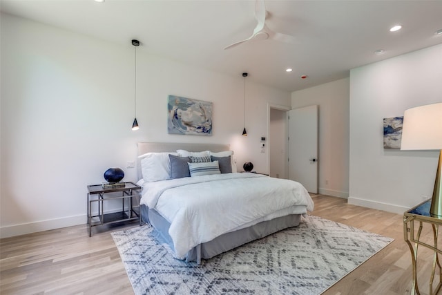4025 Hockaday Dr, Dallas, TX 75229 - bedroom featuring recessed lighting, light wood finished floors, and ceiling fan