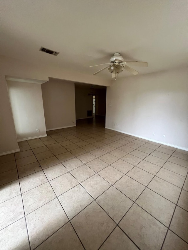 710 W Main St, Denison, TX 75020 - empty room with light tile patterned flooring and a ceiling fan