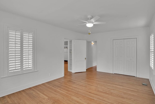 473 Albany Ave, Shreveport, LA 71105 - unfurnished bedroom with light wood finished floors, a closet, and ceiling fan