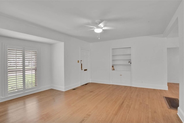 473 Albany Ave, Shreveport, LA 71105 - unfurnished room with built in features, ceiling fan, and light wood finished floors