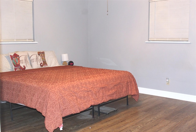 590 N Charlotte Ave, Stephenville, TX 76401 - bedroom with wood finished floors and baseboards