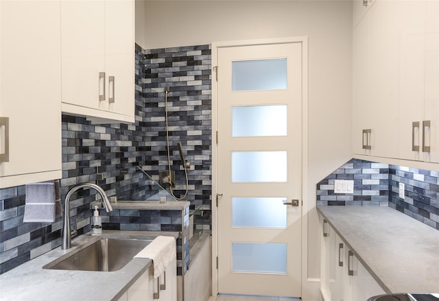 548 Oak Grove Ln, Coppell, TX 75019 - kitchen with tasteful backsplash and white cabinets