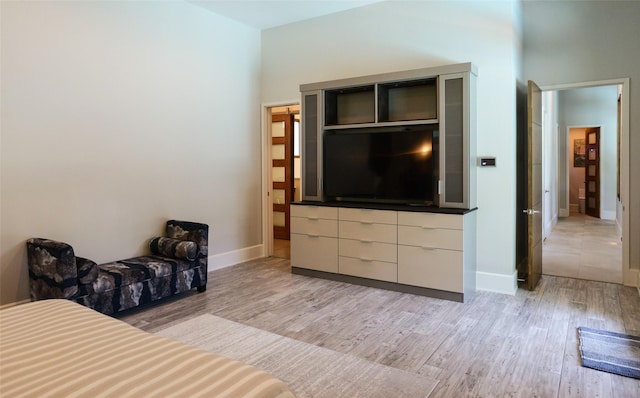 548 Oak Grove Ln, Coppell, TX 75019 - living area featuring light wood finished floors and baseboards