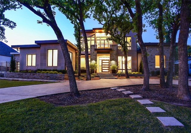 548 Oak Grove Ln, Coppell, TX 75019 - contemporary home with a yard, concrete driveway, and stone siding