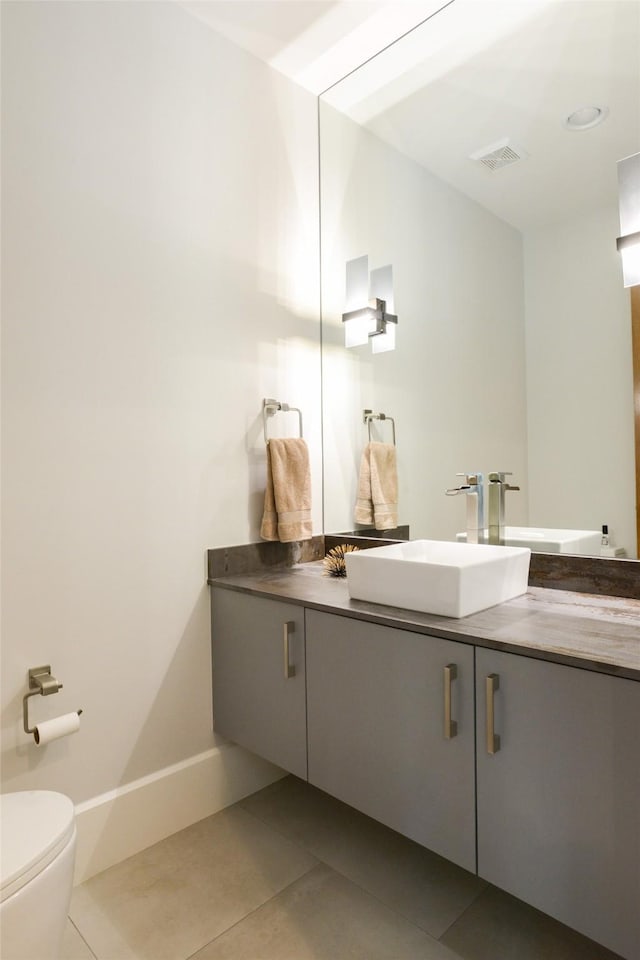 548 Oak Grove Ln, Coppell, TX 75019 - bathroom with vanity and tile patterned flooring