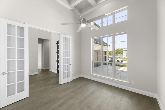 4524 Sky Harbor Dr, Rockwall, TX 75087 - spare room featuring a high ceiling, french doors, dark wood-type flooring, ceiling fan, and beam ceiling