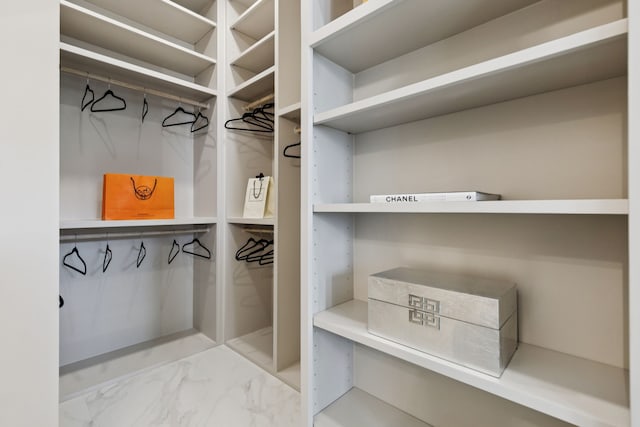 4400 Honeyvine Ln, Prosper, TX 75078 - spacious closet with marble finish flooring