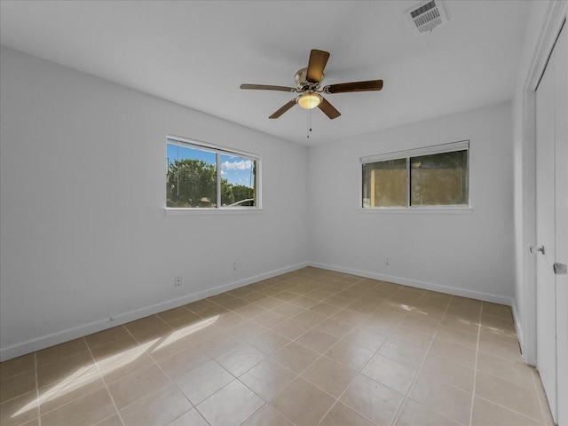 202 E Rentz St, Weatherford, TX 76086 - unfurnished room featuring ceiling fan and light tile patterned floors