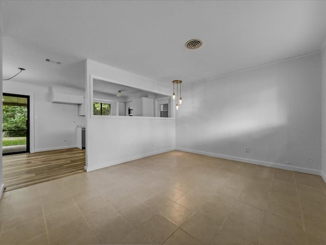202 E Rentz St, Weatherford, TX 76086 - empty room featuring plenty of natural light