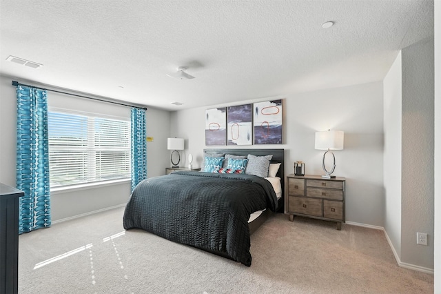 3001 Percheron Dr, Mesquite, TX 75150 - carpeted bedroom with a textured ceiling