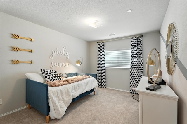 3001 Percheron Dr, Mesquite, TX 75150 - bedroom with light colored carpet and a textured ceiling