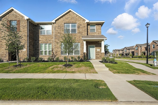 3001 Percheron Dr, Mesquite, TX 75150 - view of front of home with a front yard and brick siding