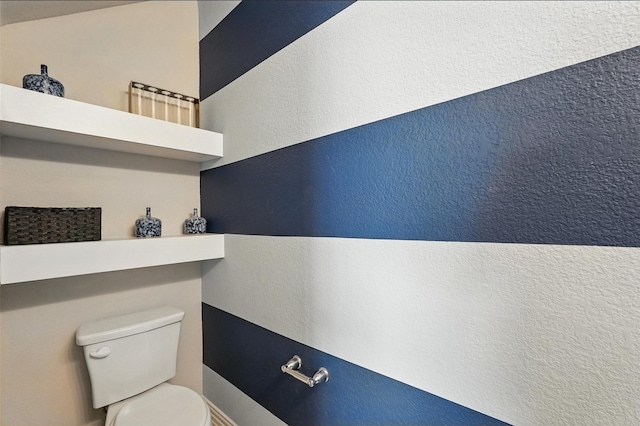 3001 Percheron Dr, Mesquite, TX 75150 - bathroom featuring toilet and a textured wall