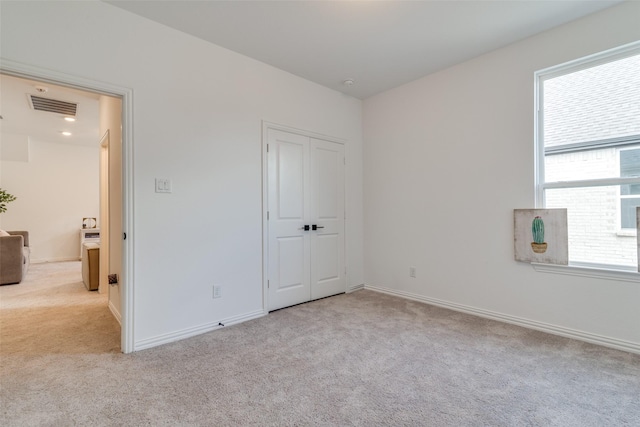 5511 Grand Ave, Sachse, TX 75048 - unfurnished bedroom with carpet flooring and a closet