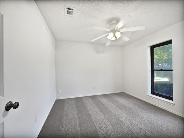 5417 Grissom Dr, Arlington, TX 76016 - empty room featuring a textured ceiling, ceiling fan, and carpet