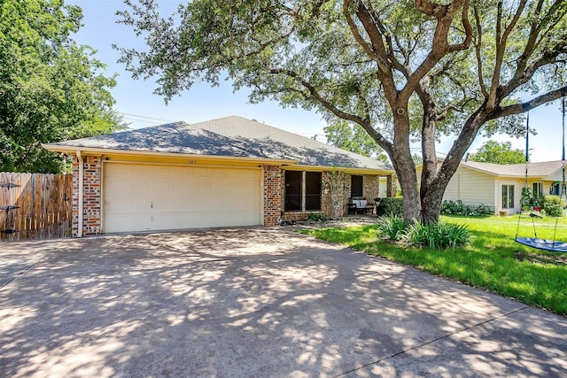 321 E Hampton Rd, Crowley, TX 76036 - ranch-style home with brick siding, driveway, and a garage
