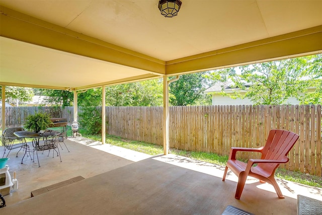 321 E Hampton Rd, Crowley, TX 76036 - fenced backyard with a patio and outdoor dining area