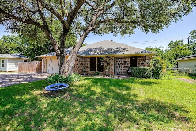 321 E Hampton Rd, Crowley, TX 76036 - view of front of house featuring concrete driveway, a garage, and brick siding