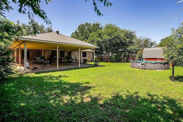 321 E Hampton Rd, Crowley, TX 76036 - view of yard with a ceiling fan and a patio area