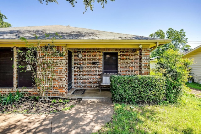 321 E Hampton Rd, Crowley, TX 76036 - view of front of property featuring brick siding and a shingled roof