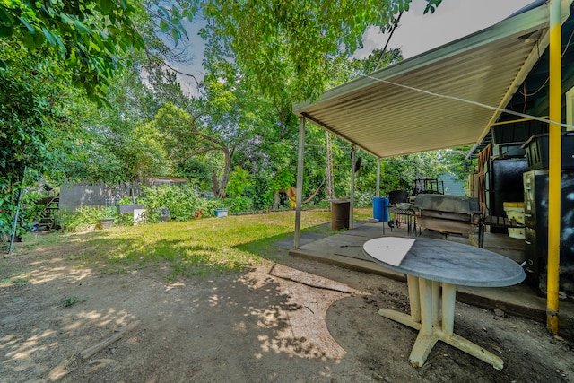 714 Macgregor Dr, Grand Prairie, TX 75050 - view of yard with a patio