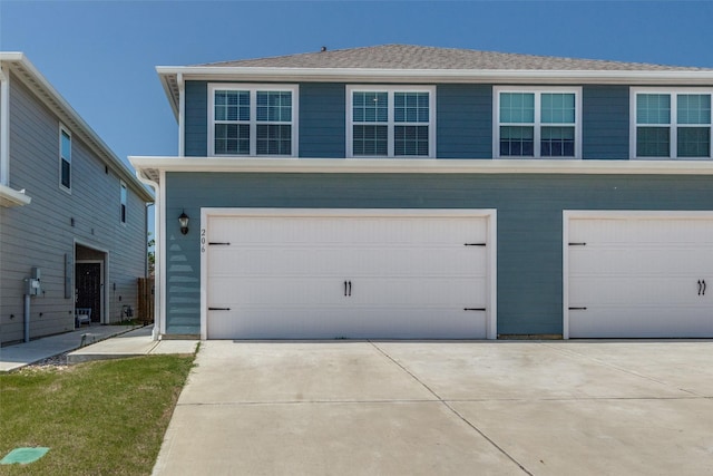 206 Marsh Ln, Princeton, TX 75407 - garage with concrete driveway