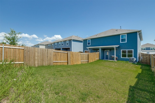 206 Marsh Ln, Princeton, TX 75407 - back of house with a fenced backyard