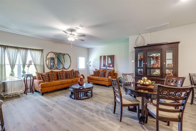 206 Marsh Ln, Princeton, TX 75407 - dining area with light wood finished floors and ceiling fan