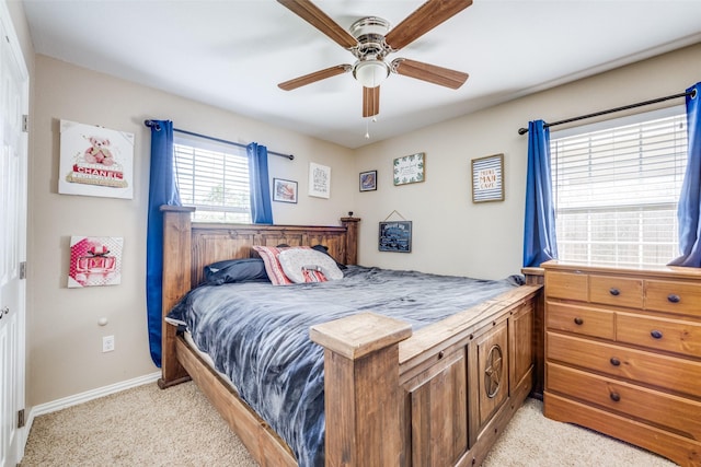 318 E Chestnut St, Denison, TX 75021 - bedroom featuring light colored carpet and a ceiling fan