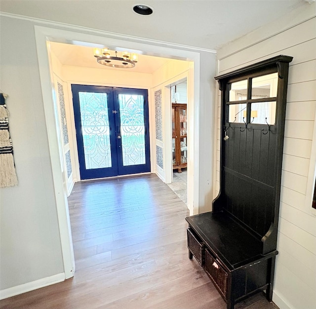 4124 Maryview Ct, Haltom City, TX 76117 - mudroom with wood finished floors, a chandelier, french doors, and ornamental molding