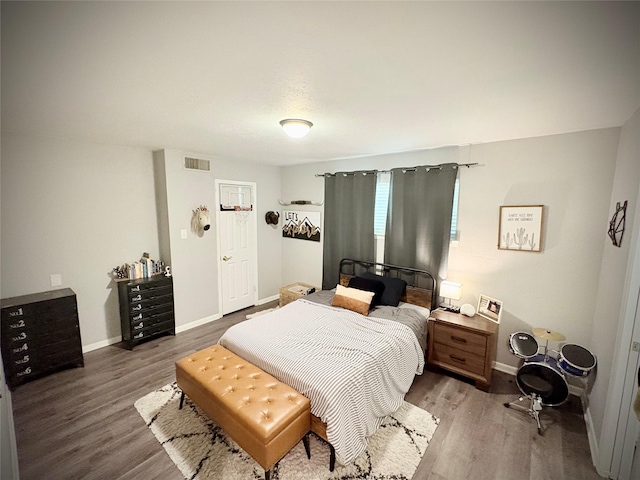 4124 Maryview Ct, Haltom City, TX 76117 - bedroom with wood finished floors and baseboards